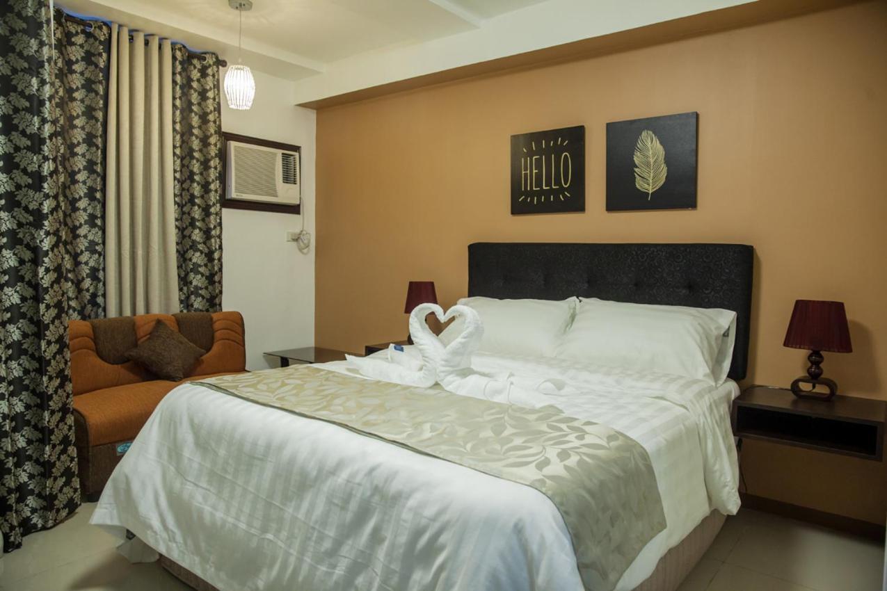 Melbourne Suites Макати Экстерьер фото